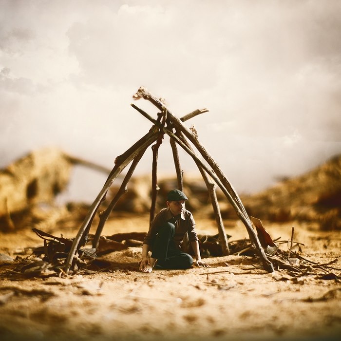 small trapped by reality — surreal photography by Achraf Baznani