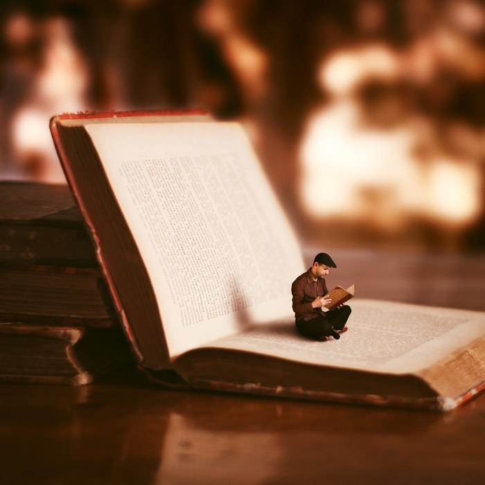 A book is a man's best friend — surreal photography by Achraf Baznani